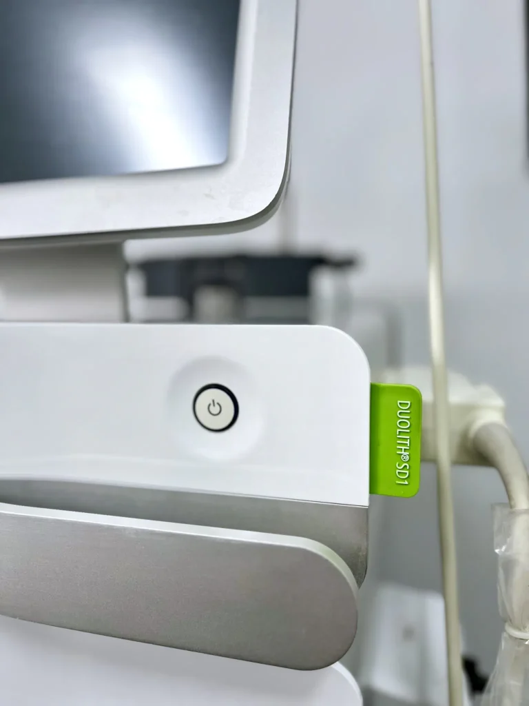 Close-up of the Storz Medical Duolith SD1 machine panel for focused shockwave therapy in Holland Park.